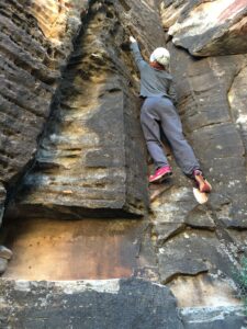 My daughter, Seneca Rayburn free climbing on our hike at Red Rock Canyon